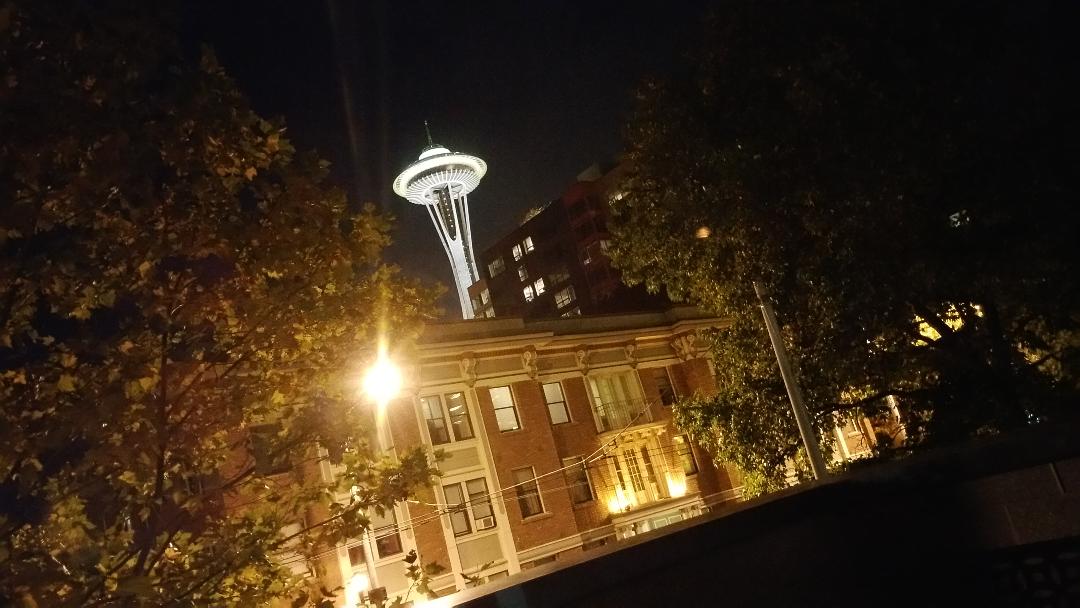 The space needle taken at night from balcony